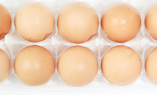 Directly above shot of eggs in container