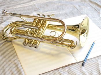 High angle view of piano on table