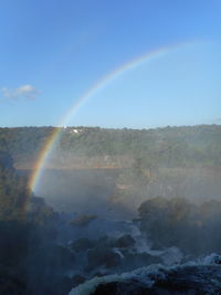 Low angle view of rainbow against sky