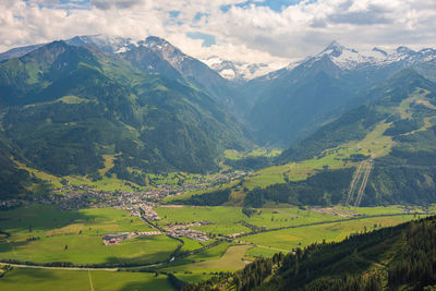 Aerial view of the town of kaprun and mountain peak kitzsteinhorn in tirol alps, austria.