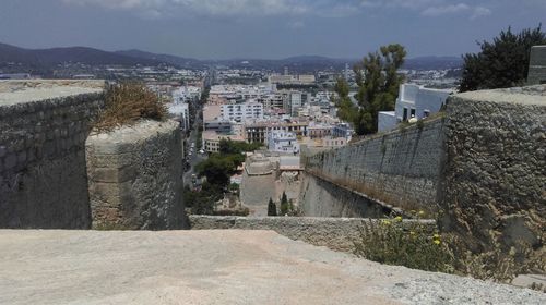 View of narrow alley in town