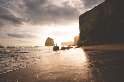 Scenic view of sea against sky at sunset