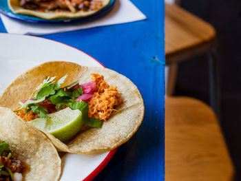 High angle view of tacos on table