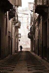 Woman walking on city street