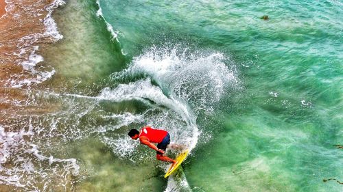 Man surfing in sea