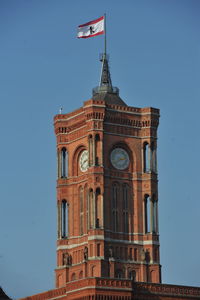 Low angle view of building against blue sky