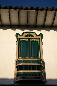 Low angle view of roof against sky