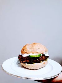 Close-up of burger in plate on table