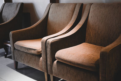 Brown cushion sofa chair armchair in living room. home interior