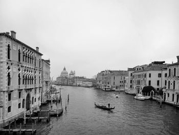 Canal passing through city buildings