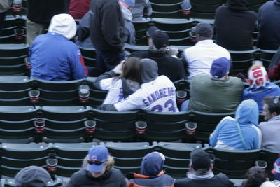 People sitting in front of crowd