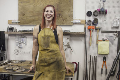 A portrait of a young woman in a dirty apron. 