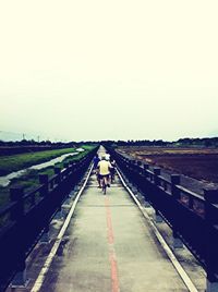 Man walking on road