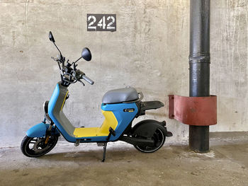 Motor scooter parked on street