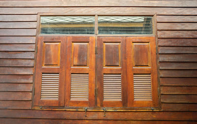 Closed wooden door of building