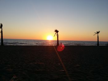 Scenic view of sea at sunset