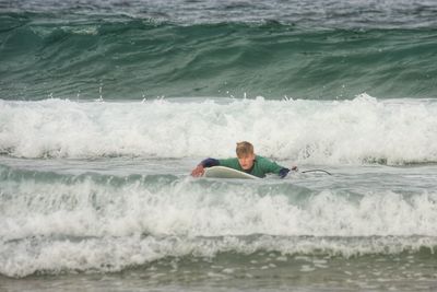 Man surfing in sea