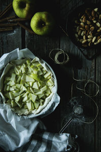 Directly above shot of chopped fruits in bowl on table