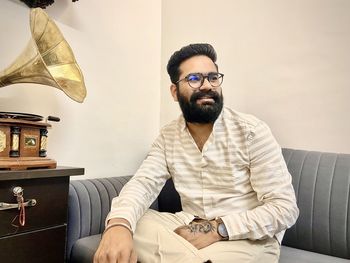 Young man sitting in office