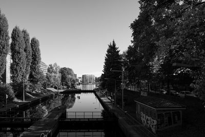 View of canal along trees in park