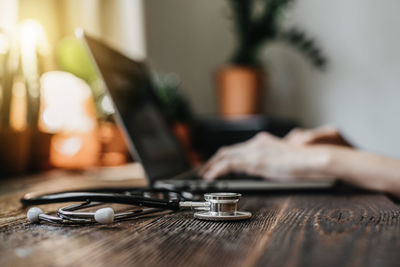 Close-up of laptop on table at home