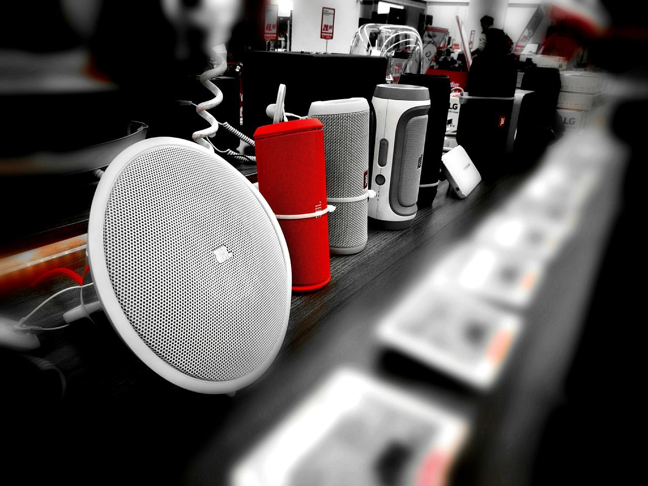 red, selective focus, man made object, large group of objects, no people