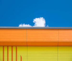 Close-up of yellow against blue sky