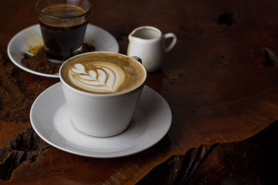 Close-up of coffee cup on table