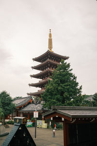 View of pagoda against cloudy sky