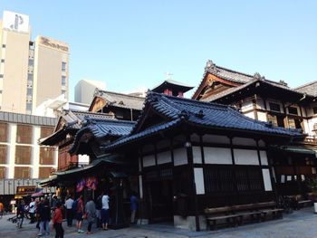 Low angle view of built structure against clear blue sky