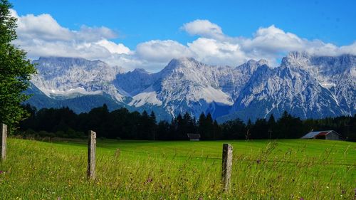 Scenic view of snowcapped mountains against sky