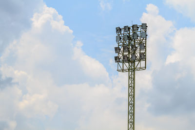 Low angle view of communications tower against sky