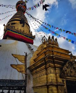 Low angle view of statue against sky