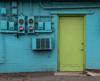 Closed door of blue building