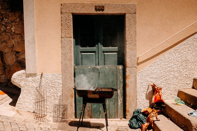 People sitting outside building