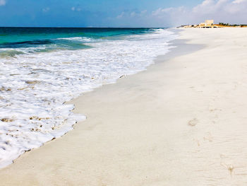 Scenic view of beach against sky