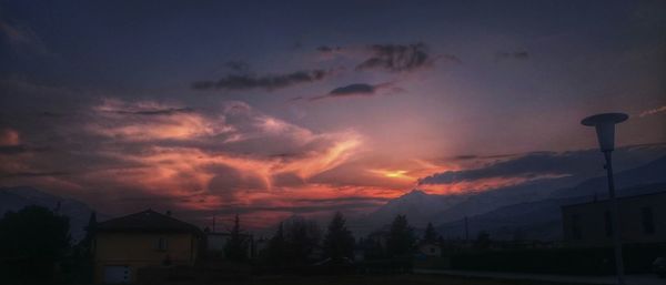 Scenic view of cloudy sky at sunset