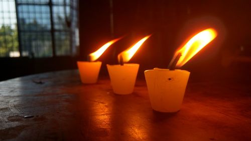 Close-up of illuminated candles