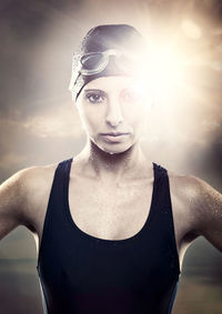 Portrait of beautiful woman against sky