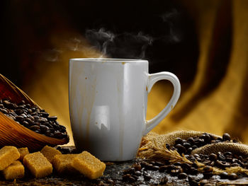 Close-up of coffee cup on table