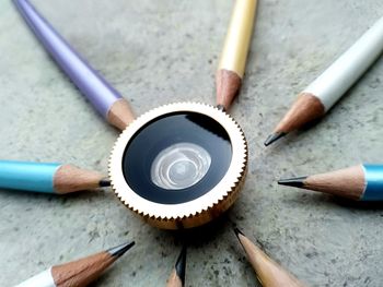 High angle view of people in pen on table
