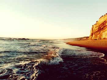 Scenic view of sea against clear sky