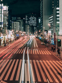 Light trails on city street at night