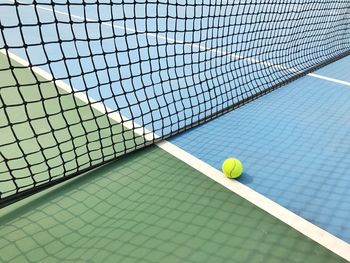 High angle view of tennis ball on field at court