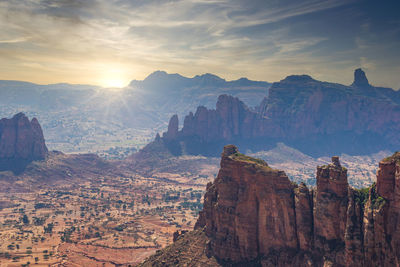 Panoramic view of landscape against cloudy sky