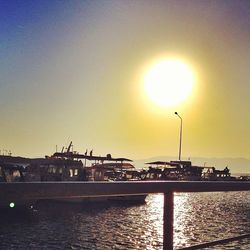 View of harbor at sunset