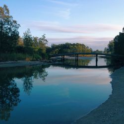 Scenic view of river against sky
