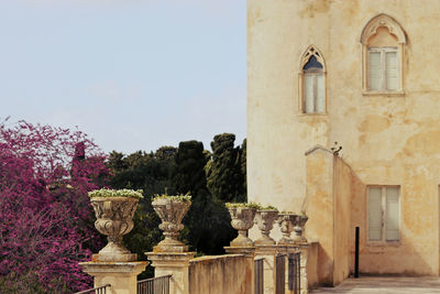 Exterior of historic building against clear sky