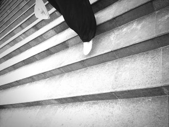 Low section of woman on steps