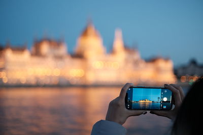 Close-up of woman using mobile phone